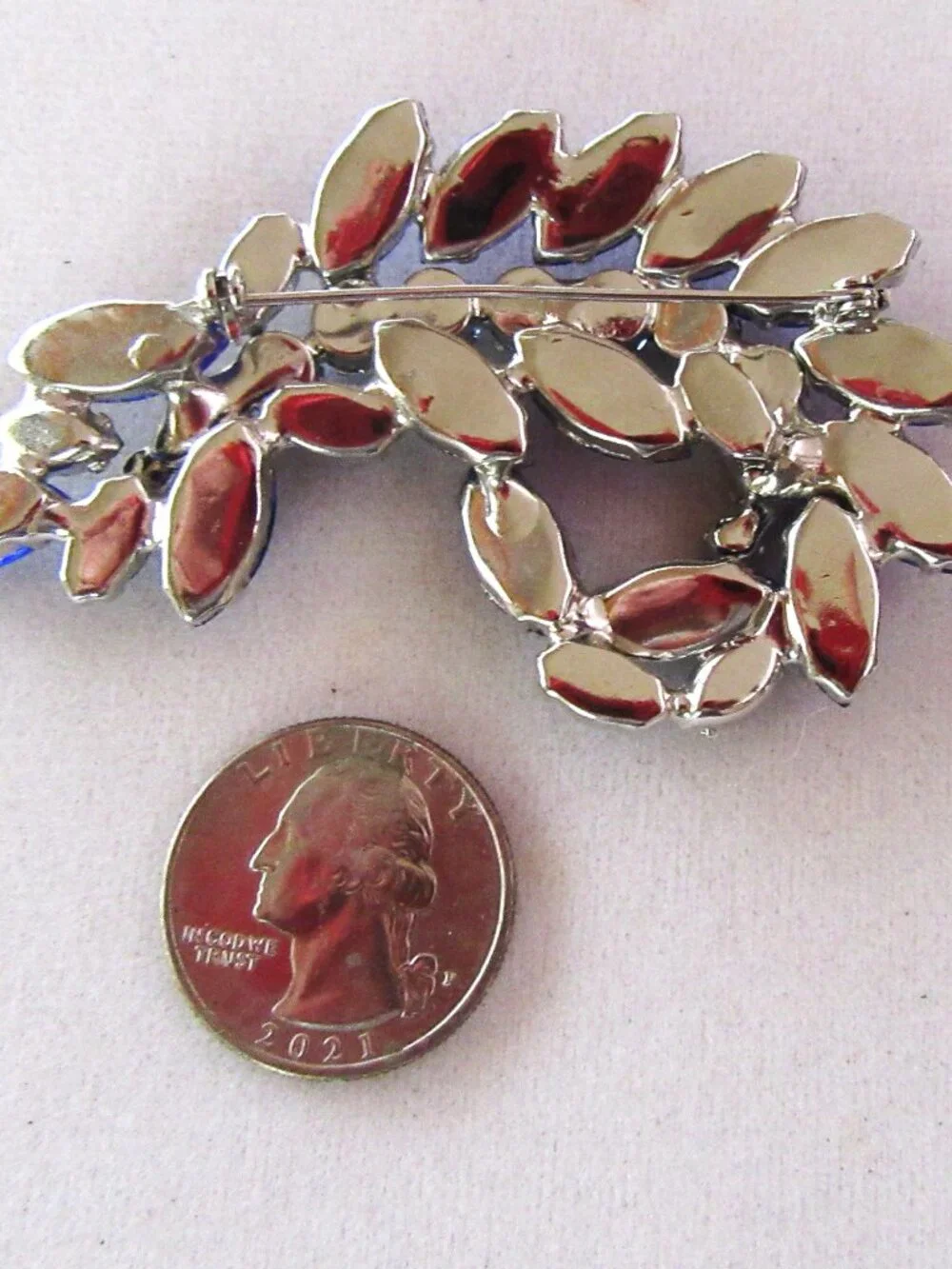 Blue rhinestone free from brooch with light & dark blue stones in silver setting